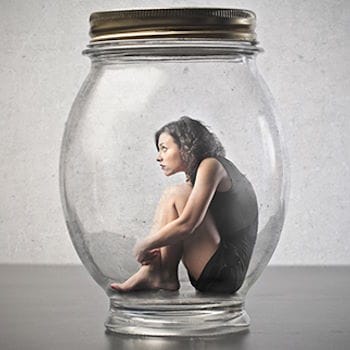 A woman trapped inside a canning jar with the lid sealed