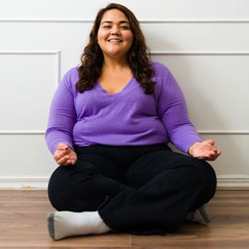 Jessie joyfully meditating